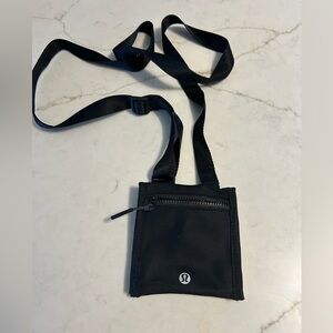 lululemon athletica Black mini wallet bag.